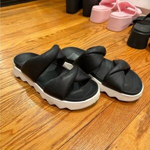 Sorel Black Knotted Slide Sandals with White Platform Sole